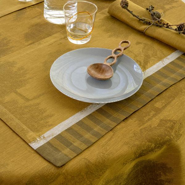 Le Jacquard Francais Souveraine table linen, gold