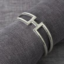 Robbe & Berking Sphinx napkin ring, Sterling silver