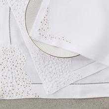 Porthault Hortensias table linen