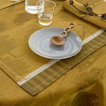 Le Jacquard Francais Souveraine table linen, gold